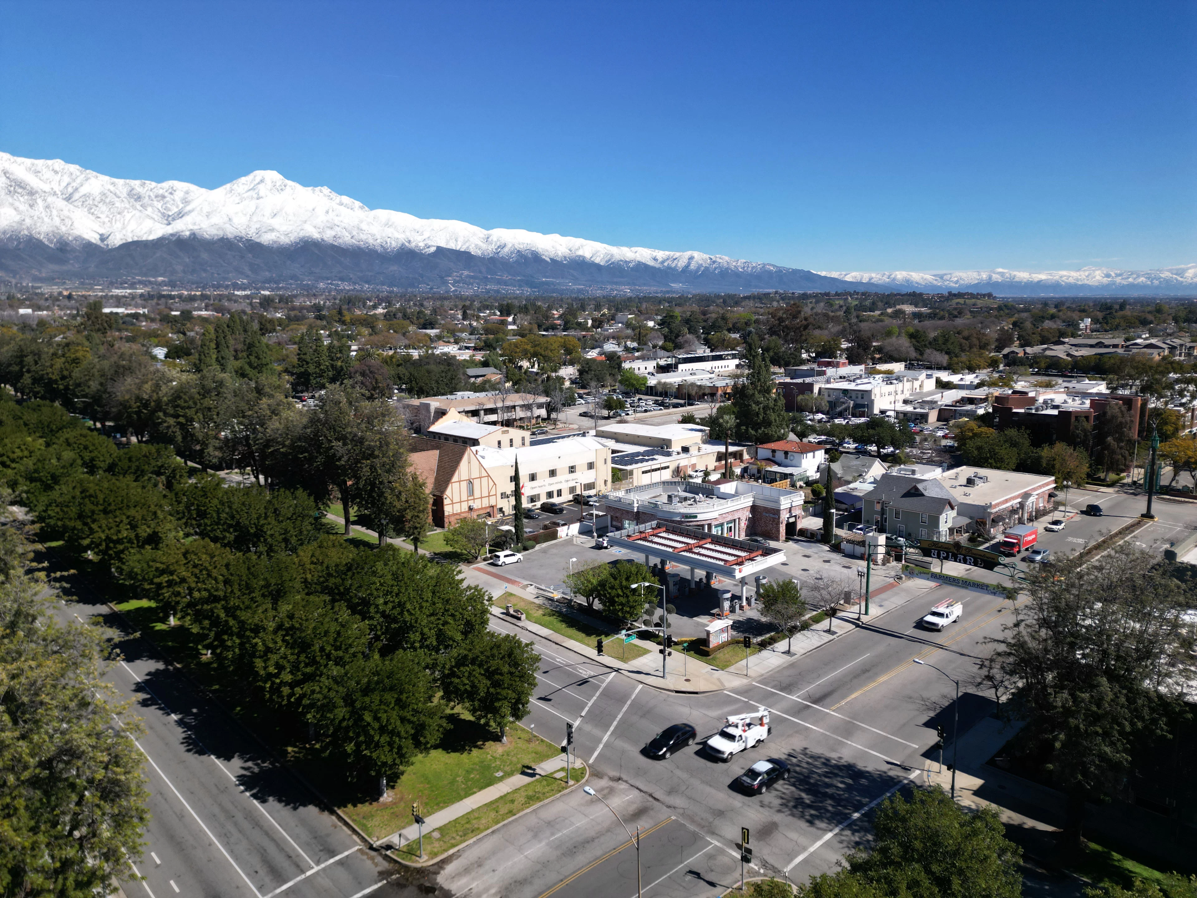 Aerial view of Historic downtown Upland with blue sky and snow-capped mountains
